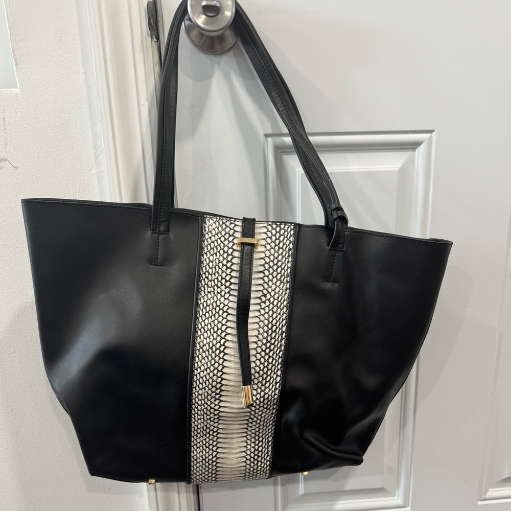 Like new Vince Camuto black leather tote bag with snake skin accent strip.